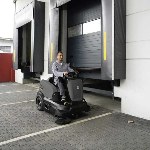 Karcher KM 90/60 ride-on floor sweeper in use